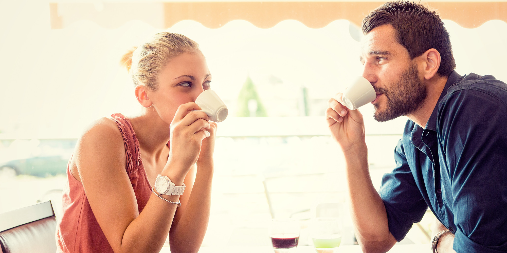 Young couple drink coffee at italian cafÃ©